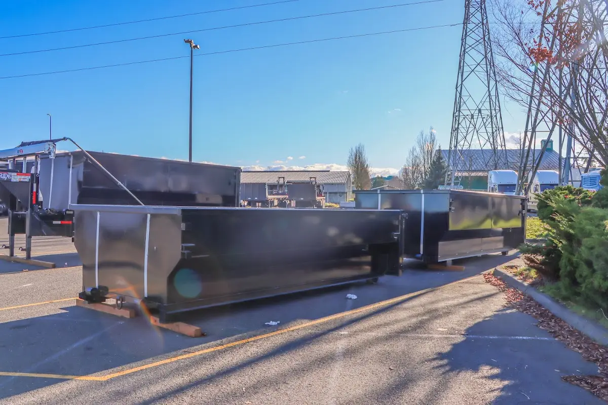 Roll-off dumpster ready for waste disposal at job site for Demolition Dumpster Rental in Syracuse